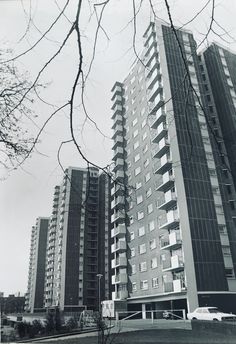 black and white photograph of two tall buildings