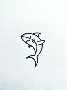 an ink drawing of a shark on white paper