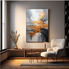 an abstract painting hangs on the wall above a chair and table in a living room