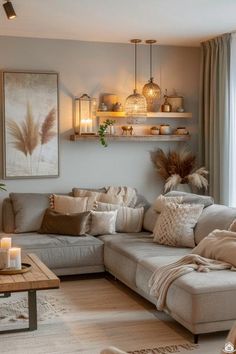 a living room filled with lots of furniture next to a large window covered in candles