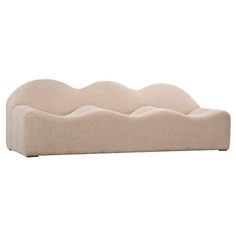 an upholstered bed that is made out of wool and has three layers of fabric