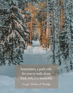 a snowy path with trees and a quote on it