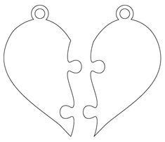 two pieces of a heart shaped jigsaw puzzle