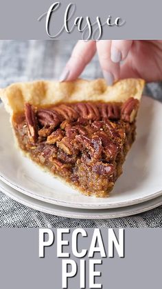 a piece of pecan pie sitting on top of a white plate