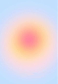 an orange and pink circle on a blue sky