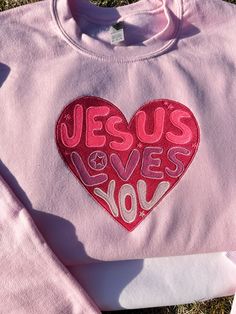 Jesus Loves You embroidered sweatshirts  sweatshirt color on picture is Pink  Super Soft Sweatshirts Embroidered sweatshirts Sleeve lengthLong sleeve Fit-Relaxed fit Style-Sweatshirt Neckline-Round Neck Composition-Cotton 60%, Polyester 40% Care instructions-Machine wash cold Solid-color Pink Long Sleeve Hoodie With Embroidered Text, Pink Long Sleeve Sweatshirt With Embroidered Logo, Pink Long Sleeve Sweatshirt With Embroidered Text, Pink Long Sleeve Sweater With Embroidered Logo, Pink Embroidered Sweatshirt With Relaxed Fit, Pink Embroidered Relaxed Fit Sweatshirt, Relaxed Fit Pink Sweatshirt With Embroidered Graphics, Pink Long Sleeve Top With Letter Embroidery, Pink Embroidered Crew Neck Sweatshirt