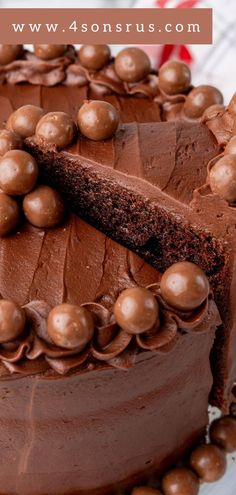 there is a chocolate cake that has been cut into pieces and is ready to be eaten