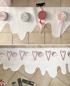 candy lollipops are hanging on the wall next to other candies and decorations