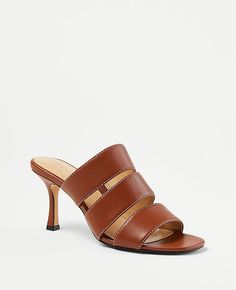 Step into elegance with the Ann Taylor Three Strap Leather Sandals, a perfect blend of style and comfort designed for the modern woman. These sandals feature:

- Size: 9 1/2
- Color: Midnight Mahogany
- Material: 100% Leather
- Gender: Female
- Open toe design
- Padded footbed for enhanced comfort
- Heel Height: 3 inches

Crafted from luxurious leather, these sandals boast a triple strap configuration that adds a sophisticated touch to any outfit. Whether you're attending a formal event or enjoy Comfort Design, Comfortable Heels, Strap Design, Toe Designs, Strap Sandals, Modern Woman, Leather Sandals, Effortless Style, Ann Taylor