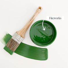 a paintbrush and bowl with the words fireworks painted on it next to each other