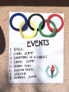 a sign with the olympic rings on it