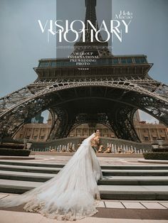 a bride and groom standing in front of the eiffel tower for their wedding photo shoot