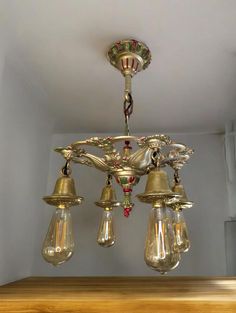 a chandelier hanging from the ceiling in a room