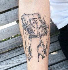 a person with a tattoo on their leg