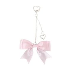 a pink bow keychain with a heart on the front and a chain attached to it