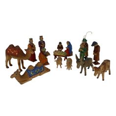 a nativity scene with figurines and animals