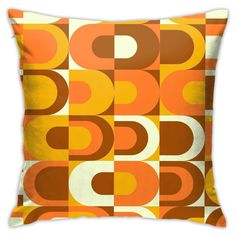 an orange and white pillow with circles on it