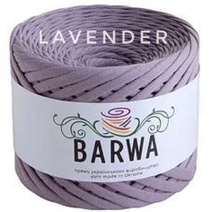 lavender colored yarn ball with label on it