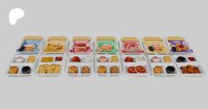 an image of some food in trays on a white background with the words lunch box