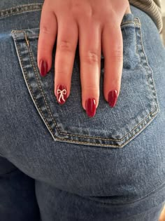 bow nails christmas nails red almond nails christmas bow nails Simple Christmas Nails Simple, Short Almond Simple Christmas Nails, Red Almond Nails With Bow, Basic Christmas Nails Almond, Cute Winter Nail Ideas Simple, Nails Idea Winter, Cool Girl Nails Aesthetic, Winter Christmas Nails 2024, Bow Red Nails