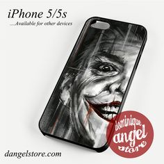 an iphone case with the joker face painted on it's back and front cover