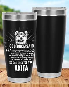 two black tumblers with the words god once said and an image of a bear