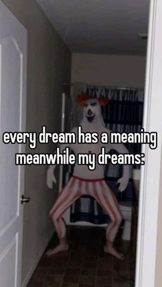 a creepy clown is standing in the hallway with his legs spread out and feet crossed