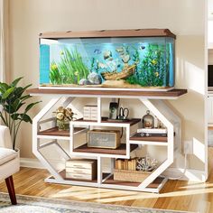 a fish tank sitting on top of a shelf in a living room next to a couch