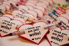 i think you are just write written on heart shaped paper tags with pens and markers