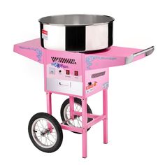 a pink cart with a pot on top of it and wheels attached to the cart