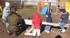 several children are playing in the playground