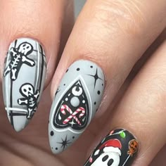 Wisconsin Nail Artist & Educator on Instagram: "Just creeping through the holidays 😏🖤 Day 2  @lightelegancehq ​​​​​​​​ ​​​​​​​​  #lightelegancegel #lightelegance #lefaves #lerocks #holidayseason #holidaynails #christmas #christmasnails #lebuttercreams #spookychristmas #creepmas #nailart #handpainted #nailpro #leeducator #whatsinsidematters #nails #nailsoftheday #mke #mkenails #mkesalon #leeducator #mkexplore #almondnails" Goth Christmas Nails Short, Christmas Horror Nails, Krampus Nail Art, Scary Christmas Nails, Horror Christmas Nails, Creepmas Nails, Christmas Goth Nails, Creepy Christmas Nails