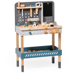 a toy workbench with tools on the top and bottom shelf, including scissors