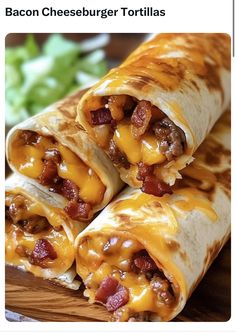 bacon cheeseburger tortillas cut in half on a cutting board