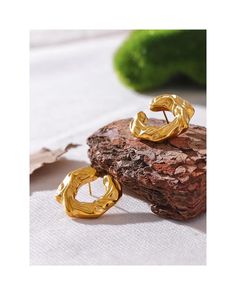 Enhances any jewelry collection with its modern and unique design Elegant and trendy design Contemporary C-shape stud hoop earrings Features a unique wave-like pattern for a bold look Made of durable stainless steel 18K gold plated for a luxurious finish Total weight: 13g Diameter of C-shape: 2.7 cm Hypoallergenic, tarnish-free and waterproof Bold and eye-catching, perfect for making a statement True definition of luxury and sophistication Suitable for both casual and formal occasions Wave Earrings, Daily Jewelry, Wave Pattern, Wedding Jewelry Earrings, Wedding Earrings, Vintage Metal, Fashion Earrings, Types Of Metal, Women's Earrings