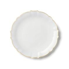 an empty white plate with gold trimmings on the rim and bottom, against a white background