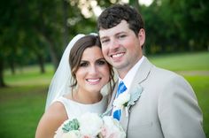 a bride and groom posing for a photo