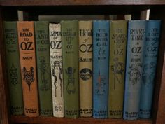 an old book shelf filled with books on top of each other and the words harry potter written in different languages