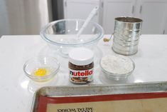 ingredients to make an egg muffin sitting on a counter