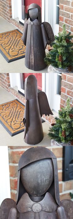 an image of some kind of statue in front of a house