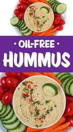 two bowls filled with hummus, carrots and cucumbers on top of each other