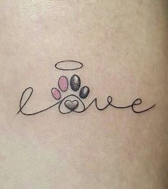 the word love is written in cursive writing with two paw prints on it