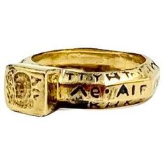 Rare and highly unusual Ancient Greek style 14K yellow gold and enamel octagonal shape amulet signet ring Provenance: Private Maine collection The complex, octagonal shaped band of this beautiful ring is composed of three surface sides to each of the eight sides with enamel inscriptions in Greek, twenty four inscriptions in all. The front square signet depicts the face of a bearded man surrounded by inscriptions in Greek. Signet rings with enamel details are rarely seen, most are either done entirely in gold or are centered by gemstones. Size: 8.25 US Signet: 8mm by 8mm Width side to side: 23mm Condition: Very Good, light surface wear commensurate with age, lovely patina. Tested for 14K gold Weight: 6.8 grams Ceremonial 14k Gold Ring, Ceremonial 14k Gold Ring Jewelry, Antique 14k Stamped Jewelry For Ceremonial Occasions, 14k Gold Ceremonial Ring, 14k Gold Ceremonial Ring Jewelry, Ancient Style Yellow Gold Ceremonial Jewelry, Ancient Yellow Gold Jewelry For Ceremonial Occasions, Ancient Style Yellow Gold Jewelry For Ceremonial Occasions, Ancient Ceremonial Hallmarked Jewelry