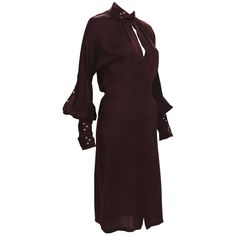 Tom Ford for Gucci Silk Dress 2003 Collection Italian Size 40 - US 4 100% Silk Color - Deep Burgundy Hidden Button Closure at Front Sleeves Finished with Triple Buckle and Grommet Bands Made in Italy. Excellent Condition. Gucci Silk V-neck Dress, Elegant Gucci Midi Dress For Work, Chic Gucci Midi Dress For Workwear, Long Sleeve Gucci Dresses For Fall, Gucci Fitted Midi Dress For Evening, Gucci Midi Evening Dress, Gucci Evening Midi Dress, Gucci Midi Length Evening Dress, Gucci Fitted Midi Dress