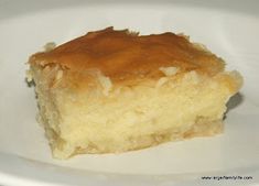 a piece of cake sitting on top of a white plate