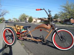 an unusual looking bike is parked on the side of the road