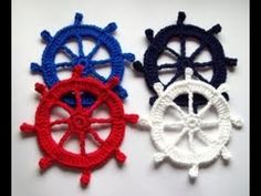 two crocheted ships wheels are next to each other