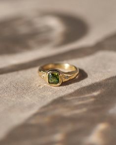 gold band ring with green tourmaline stone Lots Of Stone Rings, Bezel Diamond Engagement Rings, Simple Inlaid Diamond Ring, Dream Ring Stone, Tourmaline Ring Simple, Gemstone Rings Thick Band, Non Diamond Engagement Rings Catbird, Modern Band Rings, Wedding Band Gemstone Simple