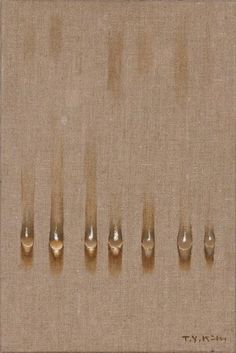 several nails are placed on the side of a piece of cloth