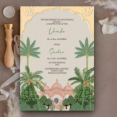 the wedding card is decorated with palm trees and an ornate arch in gold, white, and green